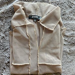 Mesh exposed seam top